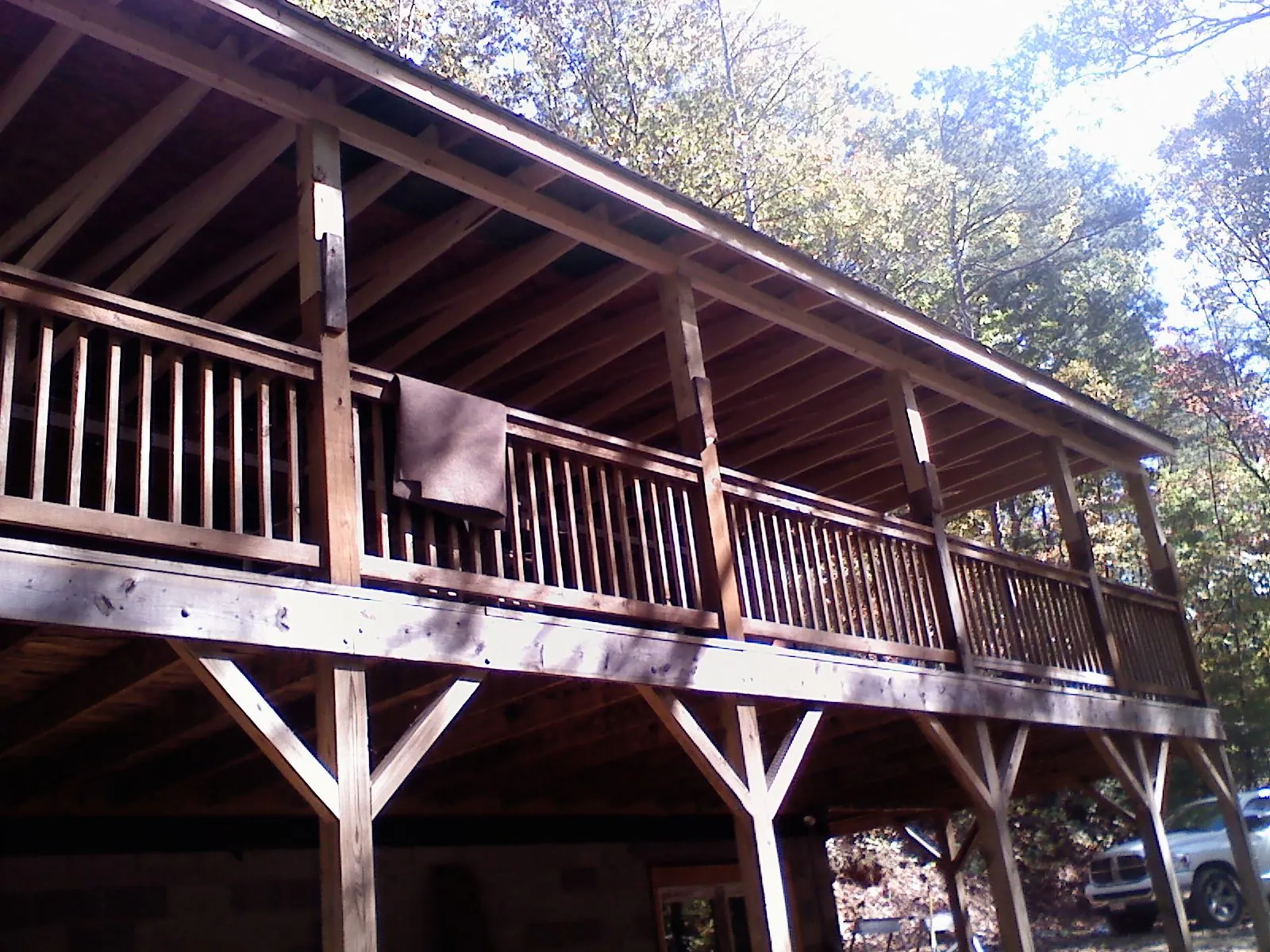 Timber framing under a new elevated porch and deck — Roof Leak Repair in Vernon Center by Roofing Brothers